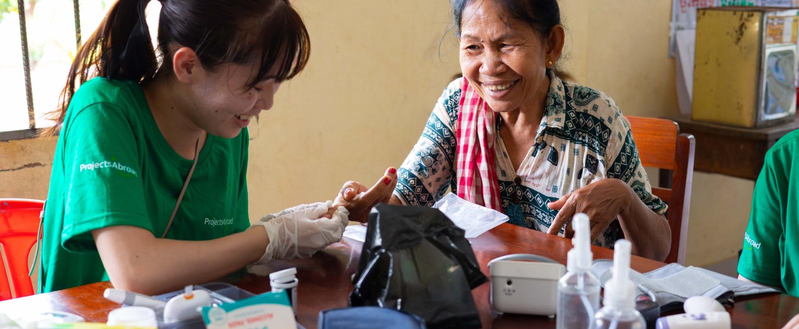 Medical intern during community outreach in Cambodia